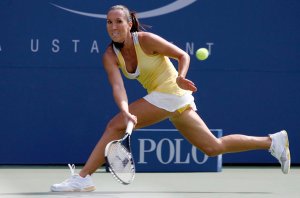 Jelena Jankovic of Serbia returns a shot to Sofia Arvidsson of Sweden during their match at the U.S. Open tennis tournament in Flushing Meadows, New York.